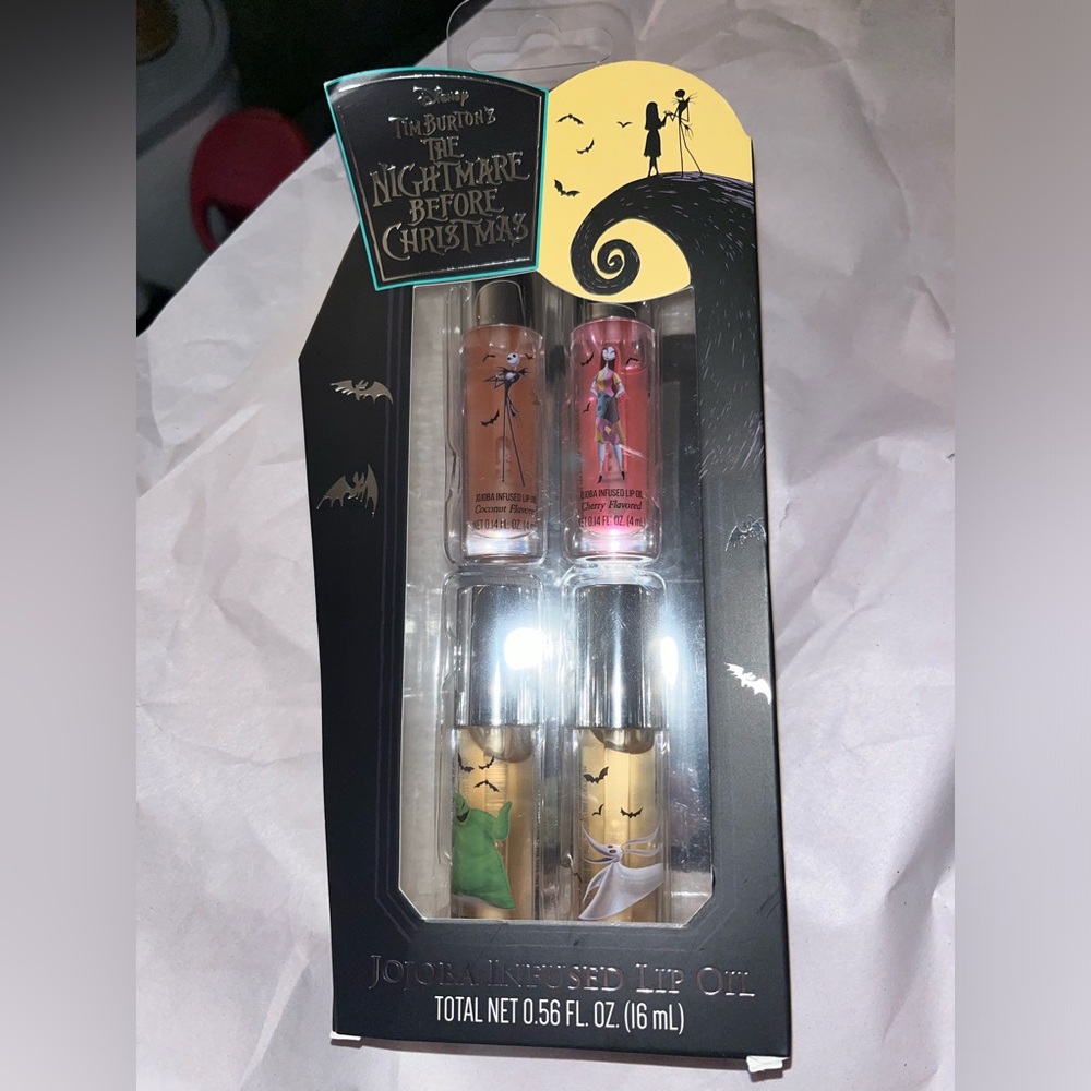 🆕 Disney Tim Burton's The Nightmare Before Christmas jojoba infused lip oil.